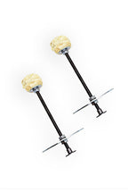 Two-rod fire torch with round crumpled yellow grips and black metal handles