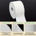 White athletic trainer tape roll with serrated edge strip and fabric weave close-up