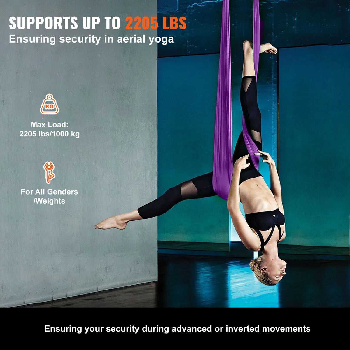 Purple aerial yoga hammock supporting an inverted yoga pose