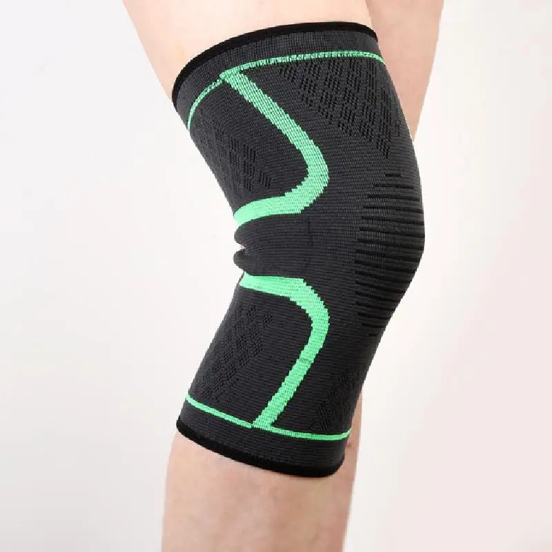 Black knee sleeve with green support bands and ribbed compression weave.