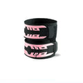 Pink wrist brace pair with black straps and pink graphic lettering, stacked