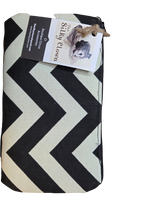 Handmade cloth gear bag with black chevron zigzag pattern and fabric handle pull