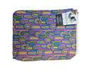 Handmade cloth gear bag with colorful rainbow wave pattern and fabric handle tab