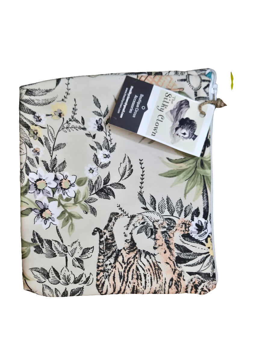 White floral-and-leaf printed cloth gear bag with drawstring and fabric loop pull