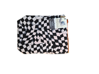 Handmade cloth gear bag with black-and-white checkered pattern and fabric handle tab