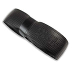 Black grip tape roll end, embossed emblem on perforated surface